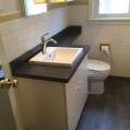 black_laminate_countertop_vanity_bathroom